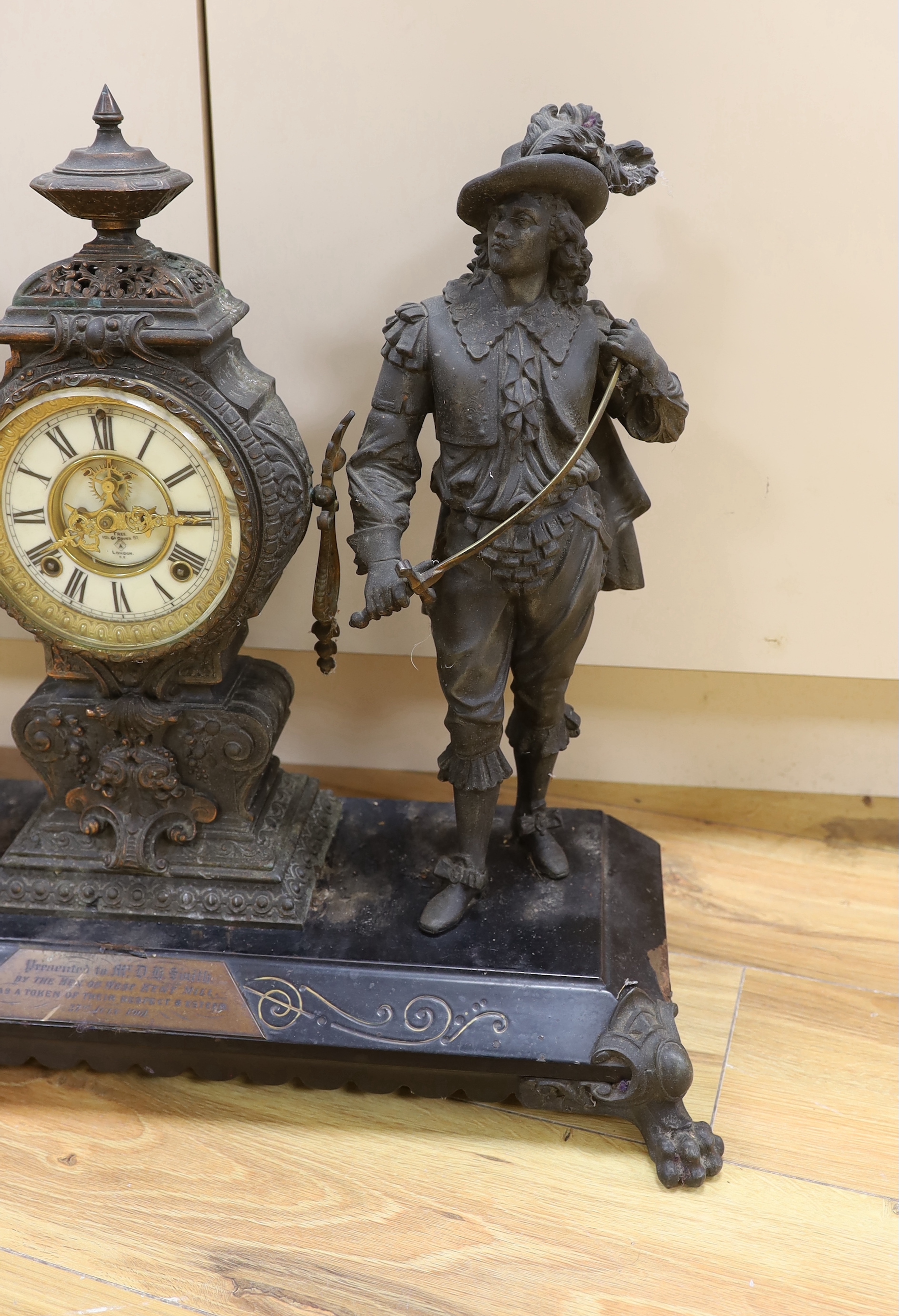 A 20th century American spelter and Cavalier figural mantel clock, 52cm high